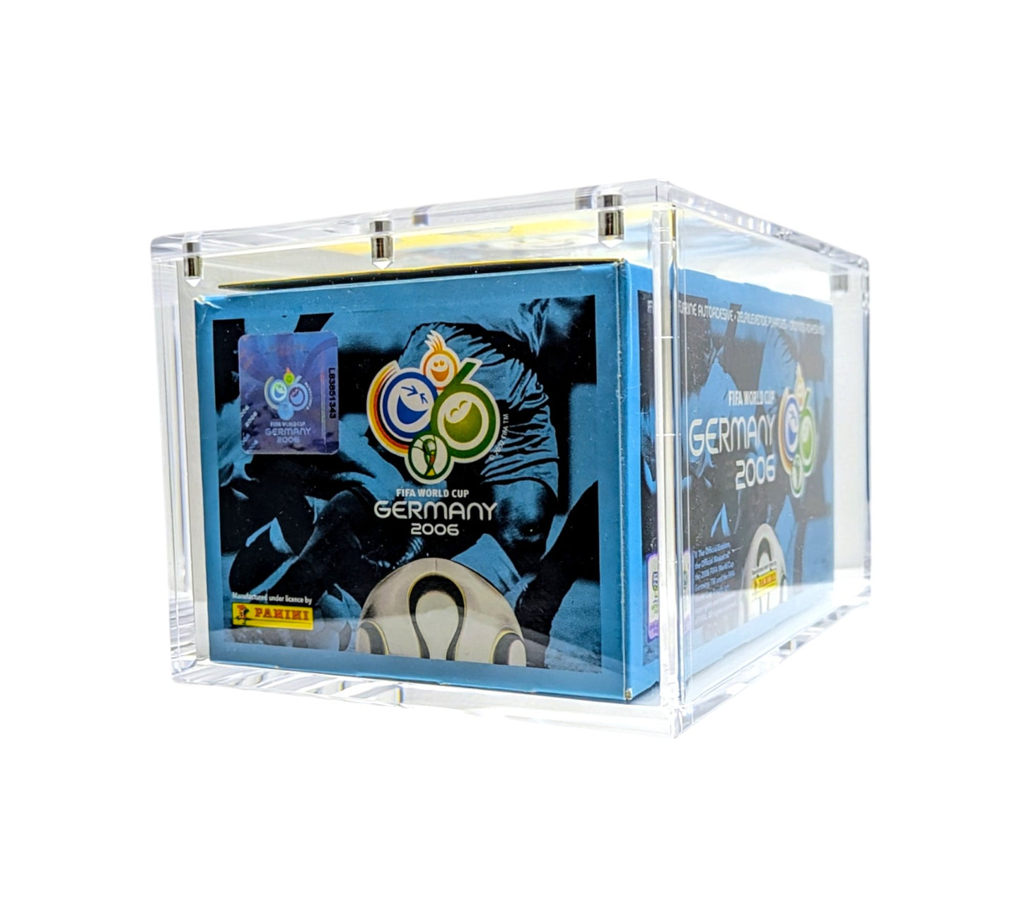 A clear acrylic display case with a box inside, featuring a soccer-themed design on the box, indicative of a collectible item.